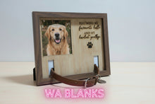 Load image into Gallery viewer, Wooden photo frame with engraved text and paw print on a shelf.
